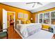 Spacious main bedroom featuring a large window and stylish decor at 290 Leigh Kay Dr, Lawrenceville, GA 30046