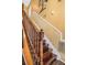 Elegant wood staircase with decorative walls adds a touch of sophistication at 290 Leigh Kay Dr, Lawrenceville, GA 30046