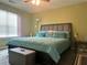 Comfortable bedroom with a ceiling fan and large bed at 2490 Laurel Nw Cir, Atlanta, GA 30311