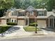 Charming townhome with well-maintained landscaping and private driveway at 2490 Laurel Nw Cir, Atlanta, GA 30311