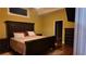 Cozy bedroom with hardwood floors, neutral walls, and generous closet space at 460 Greystone Ln, Douglasville, GA 30134