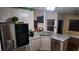Modern kitchen with stainless steel appliances and granite countertops at 460 Greystone Ln, Douglasville, GA 30134