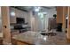 Modern kitchen with granite countertops and stainless steel appliances at 460 Greystone Ln, Douglasville, GA 30134