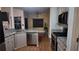 Modern kitchen with stainless steel appliances and granite countertops at 460 Greystone Ln, Douglasville, GA 30134