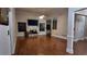 Spacious living room with hardwood floors and a fireplace at 460 Greystone Ln, Douglasville, GA 30134
