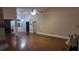 Spacious living room featuring hardwood floors, neutral walls, and generous natural light at 460 Greystone Ln, Douglasville, GA 30134