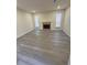 Spacious living room featuring neutral walls, fireplace, recessed lighting, and two windows at 596 Windchase Ln, Stone Mountain, GA 30083
