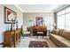Cozy living room with carpet, piano, couch, and artwork at 1490 Highland Lake Dr, Lawrenceville, GA 30045