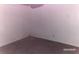Unfinished basement space with gray carpeting and white paneled walls at 285 Old College Way, Atlanta, GA 30328