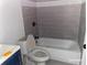 Updated bathroom with modern tiles, fixtures, and a bathtub at 285 Old College Way, Atlanta, GA 30328