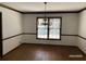 Formal dining room featuring hardwood floors, classic trim, and a chandelier at 285 Old College Way, Atlanta, GA 30328