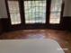 Bright kitchen with tile floors and large windows, offering plenty of natural light at 285 Old College Way, Atlanta, GA 30328