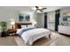 Bright bedroom with natural light, ceiling fan, and neutral decor at 401 Woodcliff Dr, Atlanta, GA 30350
