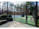 The community features fenced tennis courts available for resident use at 401 Woodcliff Dr, Atlanta, GA 30350