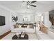 Bright open-concept living room and dining area with modern decor, hardwood floors, and lots of light at 4718 Wehunt Se Trl # 20, Smyrna, GA 30082