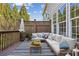 Charming outdoor patio with cozy sectional, decorative pillows, and a stylish area rug at 4718 Wehunt Se Trl # 20, Smyrna, GA 30082
