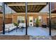 Outdoor patio area featuring modern seating, a brick facade, and a covered structure at 4718 Wehunt Se Trl # 20, Smyrna, GA 30082