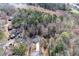 Aerial view of wooded lot with mature trees and natural landscaping providing a serene outdoor experience at 6730 Alvan Ct, Riverdale, GA 30296