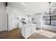 Modern kitchen with white cabinets, stainless steel appliances, and plenty of natural light at 6730 Alvan Ct, Riverdale, GA 30296