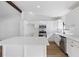 Modern kitchen with white cabinets, stainless steel appliances, and a large island for meal prep at 6730 Alvan Ct, Riverdale, GA 30296