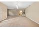 Open living space with soft carpet and ample natural light, great for relaxation at 1544 Blue Bird Way, Cumming, GA 30041