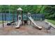 Community playground featuring slides, swings, and seating at 1544 Blue Bird Way, Cumming, GA 30041