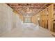 Unfinished basement offers space for storage or customization with a window for natural light at 278 Tillman Pass, Woodstock, GA 30188