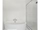 Bright bathroom featuring a soaking tub, glass shower and white marble tile at 278 Tillman Pass, Woodstock, GA 30188
