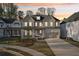Beautiful two-story house with a front-facing garage, an inviting front porch, and meticulous landscaping at 278 Tillman Pass, Woodstock, GA 30188