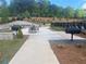 Outdoor grilling area with stainless steel grills and seating for entertaining at 278 Tillman Pass, Woodstock, GA 30188
