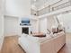 Spacious living area featuring a fireplace and comfortable seating for a relaxing ambiance at 278 Tillman Pass, Woodstock, GA 30188