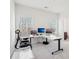 Bright home office with three monitors, a modern desk, and an ergonomic chair at 278 Tillman Pass, Woodstock, GA 30188