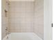 An interior shot features a tiled shower with chrome shower head and bathroom tile at 278 Tillman Pass, Woodstock, GA 30188