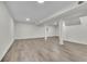 Open basement space with modern flooring and neutral color palette at 4843 Caboose Nw Ln, Acworth, GA 30102
