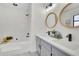 Bathroom with a modern double sink vanity at 4843 Caboose Nw Ln, Acworth, GA 30102