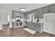Updated kitchen with gray cabinetry, modern appliances, and ample counter space at 4843 Caboose Nw Ln, Acworth, GA 30102