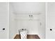Laundry room featuring built-in shelving and storage at 4843 Caboose Nw Ln, Acworth, GA 30102
