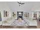 Bright living room featuring vaulted ceilings, fireplace, and large windows at 4843 Caboose Nw Ln, Acworth, GA 30102