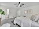 Spacious main bedroom with ceiling fan and ensuite bathroom at 4843 Caboose Nw Ln, Acworth, GA 30102