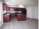 Kitchen with ample counter space, island, stainless appliances, and dark cabinetry at 7267 Appaloosa Cv, Fairburn, GA 30213