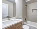 Bathroom features modern vanity and shower-tub combo at 810 Commodore Nw Dr, Atlanta, GA 30318