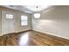 Bright dining area features hardwood floors and a large window at 810 Commodore Nw Dr, Atlanta, GA 30318