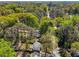 A high aerial shot of the house and the neighborhood highlights the lush greenery and surrounding area at 1350 Elizabeth Sw Ave, Atlanta, GA 30310
