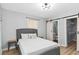Bedroom featuring a queen bed, closet, and ensuite bath, offering comfort and convenience at 1350 Elizabeth Sw Ave, Atlanta, GA 30310