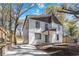 Inviting exterior view showcasing a modern two-story home with a spacious driveway and well-maintained landscaping at 1350 Elizabeth Sw Ave, Atlanta, GA 30310