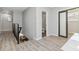 Hallway featuring durable wood flooring and natural light at 1350 Elizabeth Sw Ave, Atlanta, GA 30310