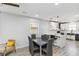 Bright kitchen and dining area with modern finishes, including white cabinets, and hardwood floors at 1350 Elizabeth Sw Ave, Atlanta, GA 30310