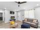Comfortable living room featuring hardwood floors, a modern fireplace, and stylish seating arrangements at 1350 Elizabeth Sw Ave, Atlanta, GA 30310