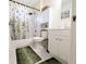 Bathroom with white tile, a shower and tub, a sink and a cabinet at 140 Mount Zion Se Rd # 0034, Atlanta, GA 30354