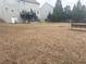 Spacious backyard with a deck perfect for entertaining and outdoor relaxation at 179 Bradshaw Park Dr, Woodstock, GA 30188